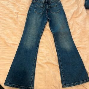 Flare jeans with front and back pockets by Gap Kids size 10